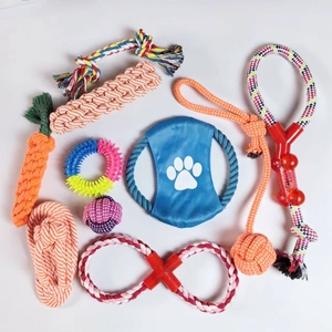 Macro shot of durable cotton rope toys and rubber rings for dog teething and play