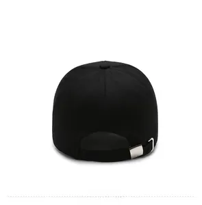 Detail view of the black baseball cap rear with an adjustable silver metal buckle