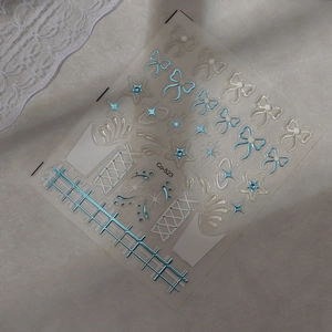 Blue bow and star nail stickers with 3D embossed ice crystal patterns on Co-523 sheet