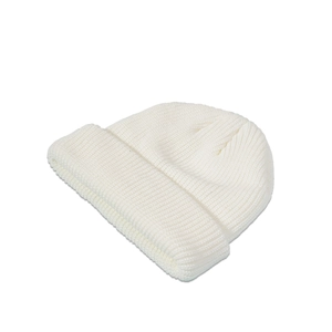 Detailed close-up of soft white ribbed knit winter hat for children showing texture