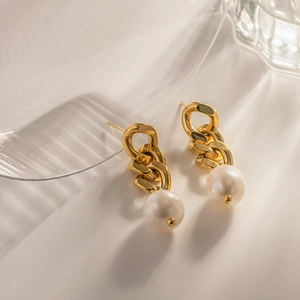 Golden Cuban link chain earrings with elegant white pearl drops for a modern women style