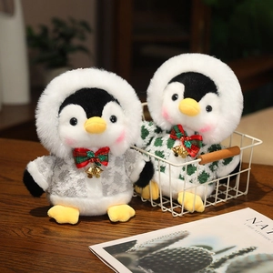 Cute Christmas penguin plush toy set wearing lace and tweed coats with small gold bells