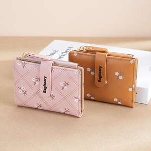 Short PU leather floral wallet for women featuring heart-quilted pattern and snap closure