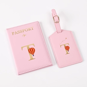 Pink PU leather passport holder and luggage tag set with gold letter T and hot air balloon