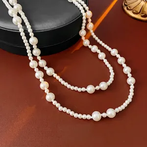 Elegant double-layered gradient pearl necklace with magnetic clasp for women's winter wear