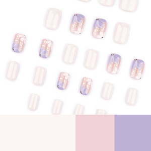 Sweet floral press-on nails with purple flower petals and gold foil accents in short square