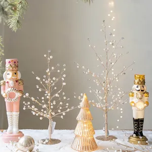 Christmas nutcracker soldiers and glowing decorative trees on snowy background