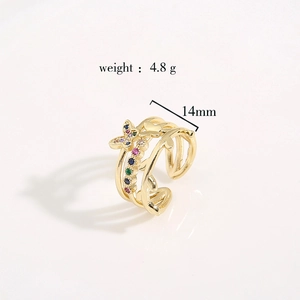 Golden butterfly open ring with colorful zircon stones and leaf accents on white background