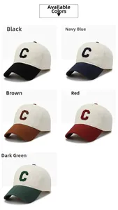Detail of multi-color cotton baseball caps with textured letter C towel embroidery