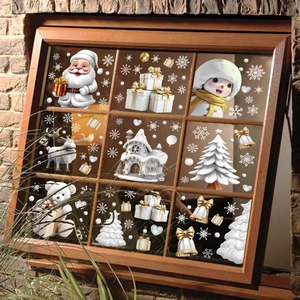 Festive 3D Christmas window stickers with Santa, snowman, and reindeer on glass pane