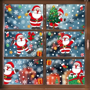Christmas window decals with Santa Claus, snowflakes and festive ornaments on glass