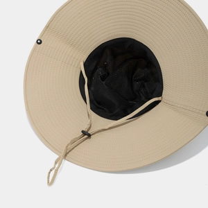 Detail of hiking sun hat with 12cm wide brim, breathable mesh lining and windproof cord
