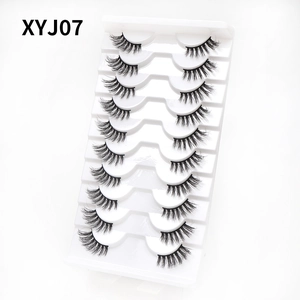 Macro shot of 10 pairs of black cat eye eyelashes model XYJ07 on a professional white tray