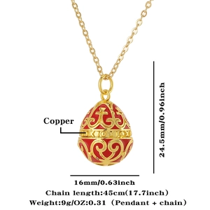 Detail of red and gold egg pendant with dimensions 24.5x16mm and 45cm chain length