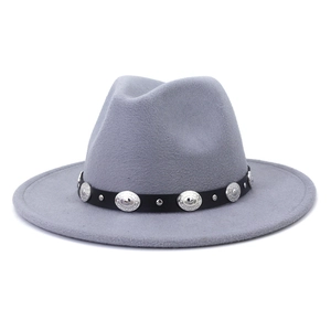 Detail of grey wool felt fedora featuring a black leather belt with silver metal studs