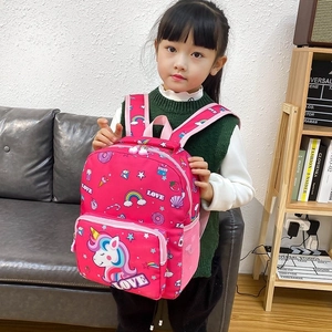 Cute pink unicorn backpack for girls with rainbow prints for school and daily use