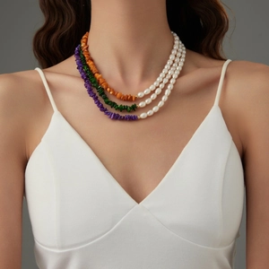 Three-layer layered necklace featuring white pearls and colorful semi-precious stones