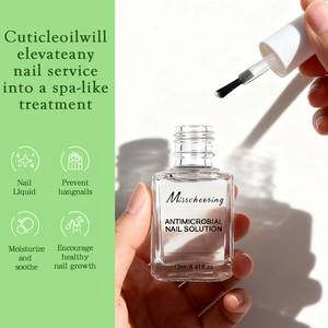 Detail showing the 12ml nail repair oil bottle with applicator brush and fluid texture