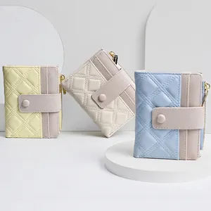 Short quilted tri-fold wallet for women with multi-card slots and side zipper pouch