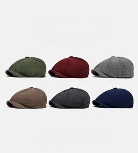 Detailed grid view of six vintage herringbone tweed newsboy caps in various classic colors