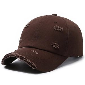 Distressed dark brown baseball cap with ripped details and retro street style design