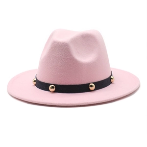 Pink wool fedora hat for men and women featuring a black band with gold stud accents