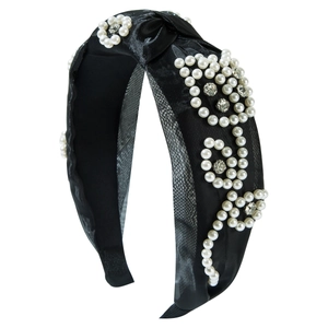 Elegant headband featuring white pearls and rhinestones in flower patterns on black satin