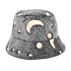 Close-up of grey plush bucket hat featuring white moon and stars embroidered pattern