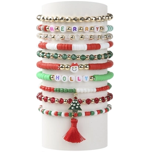Detailed set of 10 Christmas bracelets with Santa charms, Merry and Holly letter beads