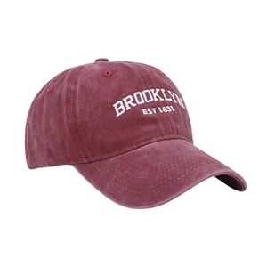 Vintage burgundy washed cotton baseball cap with Brooklyn embroidery in a 45-degree view