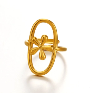 Minimalist gold flower ring with geometric oval frame and polished stainless steel finish
