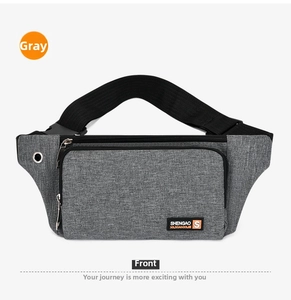 Detail of gray oxford cloth sports waist bag with headphone port and adjustable strap