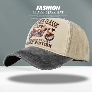 Detailed macro view of vintage motorcycle mesh cap with distressed brim and custom print