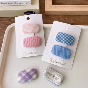 Pastel fabric hair clip set with checkered and wavy patterns for girls and women