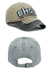 Detail of vintage washed cotton baseball cap with 3D embroidery and worn edges