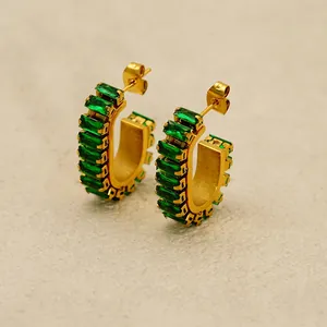 C-shaped gold-plated stainless steel earrings with emerald-cut green cubic zirconia