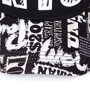 Hip hop flat brim hat with black and white graffiti print and detailed embroidery