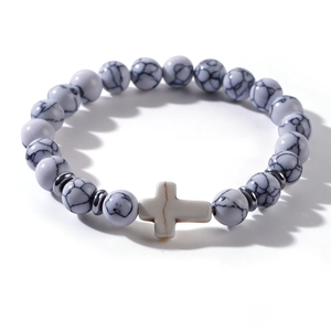 Cross beaded bracelet featuring white marble texture beads and silver spacers on white base