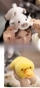 Close-up of soft plush cow and duck toys featuring premium faux fur and cute embroidery