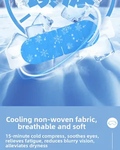 Detail of disposable cooling eye mask with blue snowflake pattern on icy background
