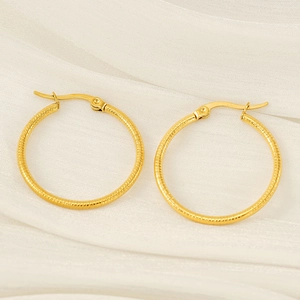 Elegant 18K gold plated titanium steel hoop earrings with textured spiral design for women