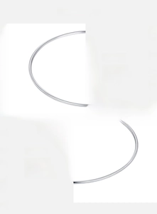 Detailed macro view of polished S925 sterling silver bangle with mirror-like finish