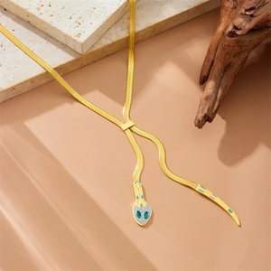 Gold-plated stainless steel snake necklace with green gem eyes and crystals