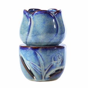 Tulip ceramic essential oil burner with blue glaze finish and hollow carved base