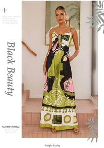 Detail of digital geometric print jumpsuit with tie-front bow and thin straps