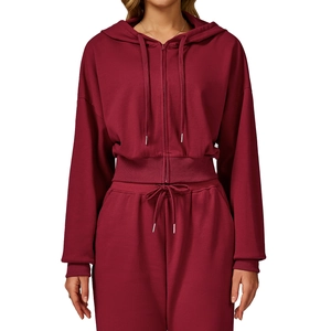 Women's burgundy zip-up hoodie and high-waisted jogger set in premium cotton knit