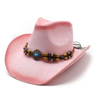 Pink woven western cowboy straw hat with bohemian beaded band and turquoise accent