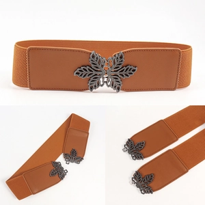 Detail view of brown elastic waist belt with metal leaf buckle and PU leather accents