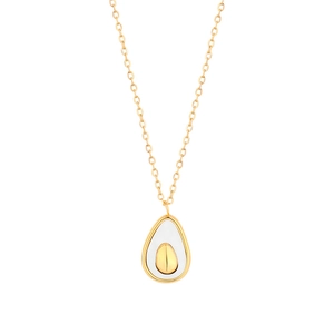 Close-up of a gold avocado pendant with white enamel inlay on a delicate link chain