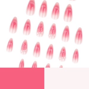 Faux ongles 3D nœuds avec dégradé rose, effet œil de chat et détails en perles